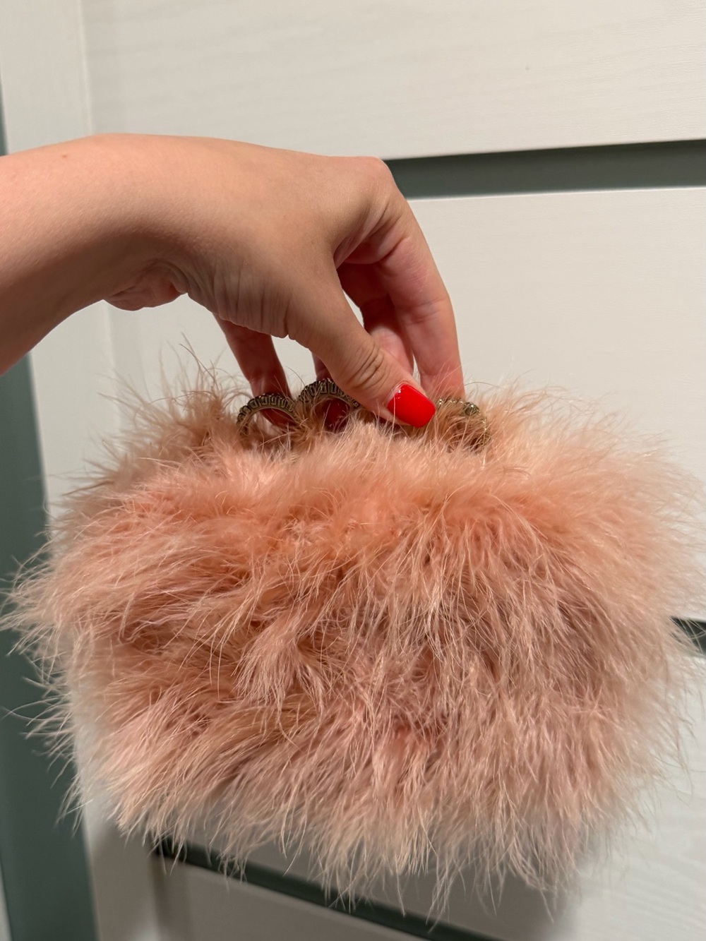 BCBGMaxAzria Blush Feathered Ring-Handle Clutch